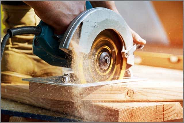  man using circular saw