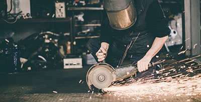 Picture of a man using a saw