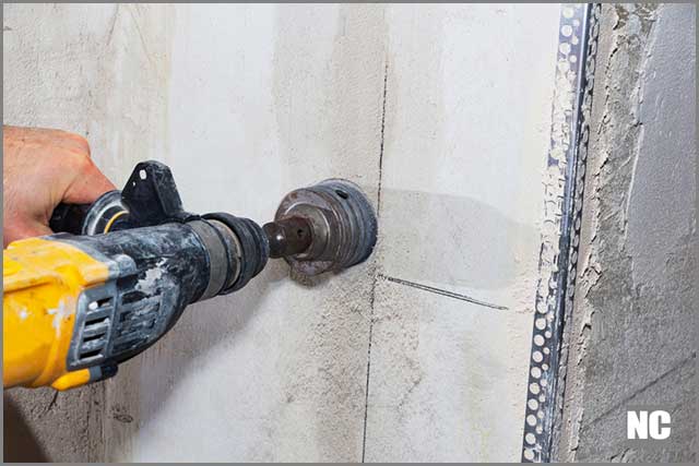 Drilling hole into a wall