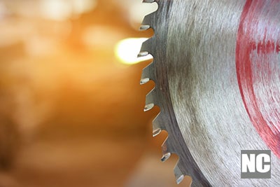 Close up blade of circular saw on blurred background