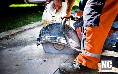 A picture of numerous concrete saws arranged side by side