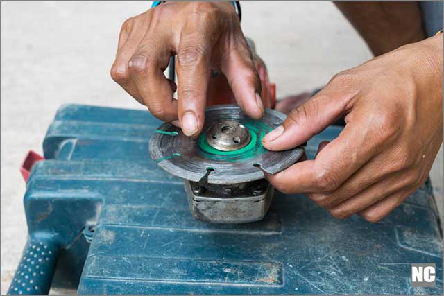 Man installing module after cleaning