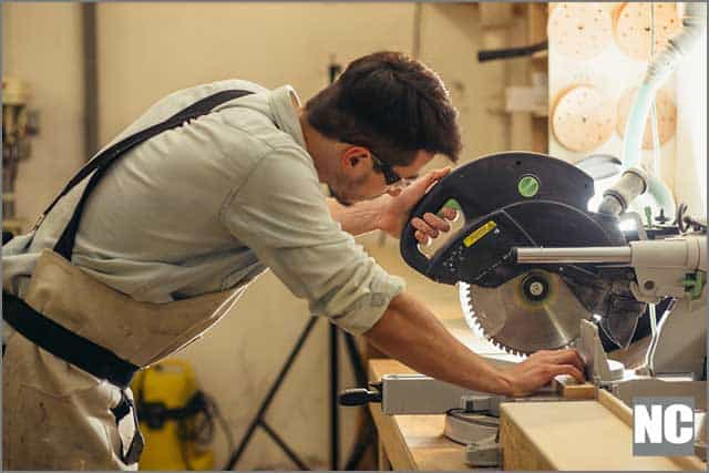 Worker is using TCT saw blade to cut items