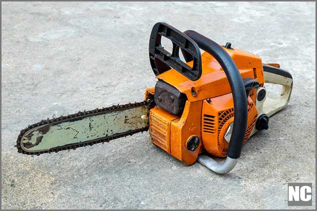 A construction worker making cuttings in a concrete floor