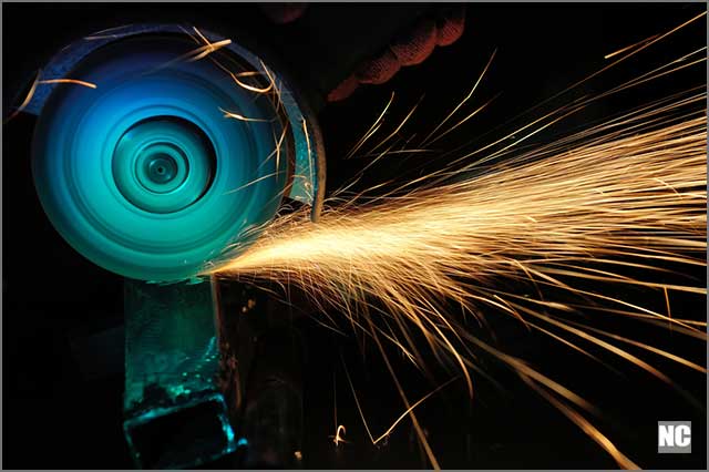 Sparks while grinding iron