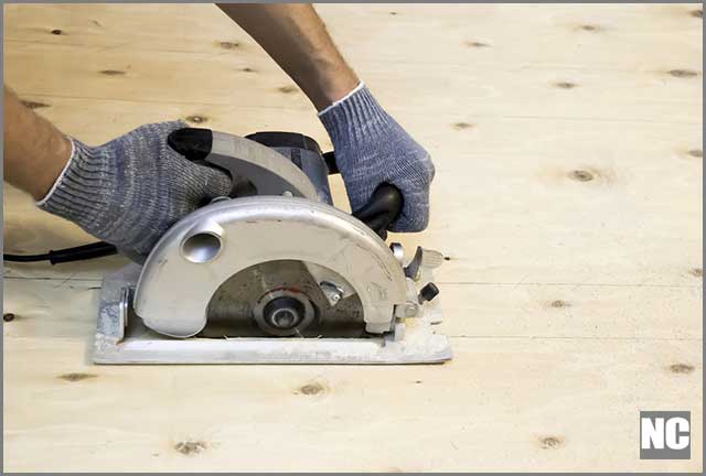 A man working with a circular saw