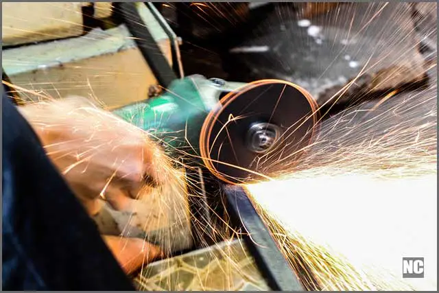 A carbide metal cutter cutting metal