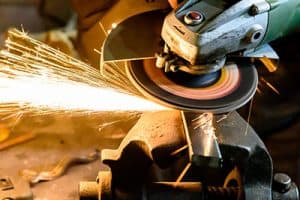 A metal grinding wheel in action