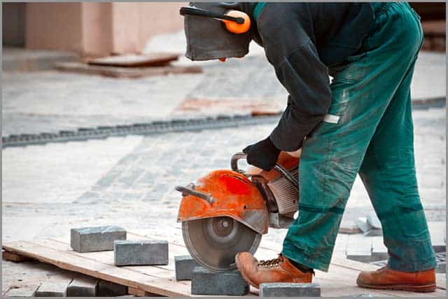 Worker using a Composite Blade