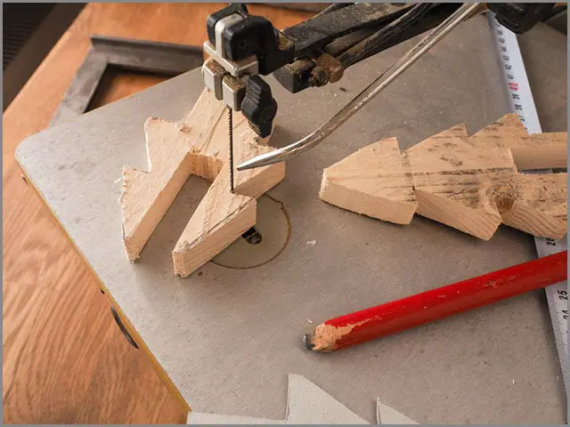 Pinned scroll saw blade.