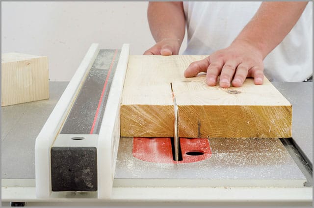 A properly aligned and parallel workpiece and rip fence.
