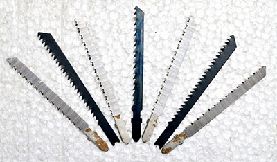 Set of reciprocating saw blades.