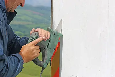 Cutting of fiberglass.