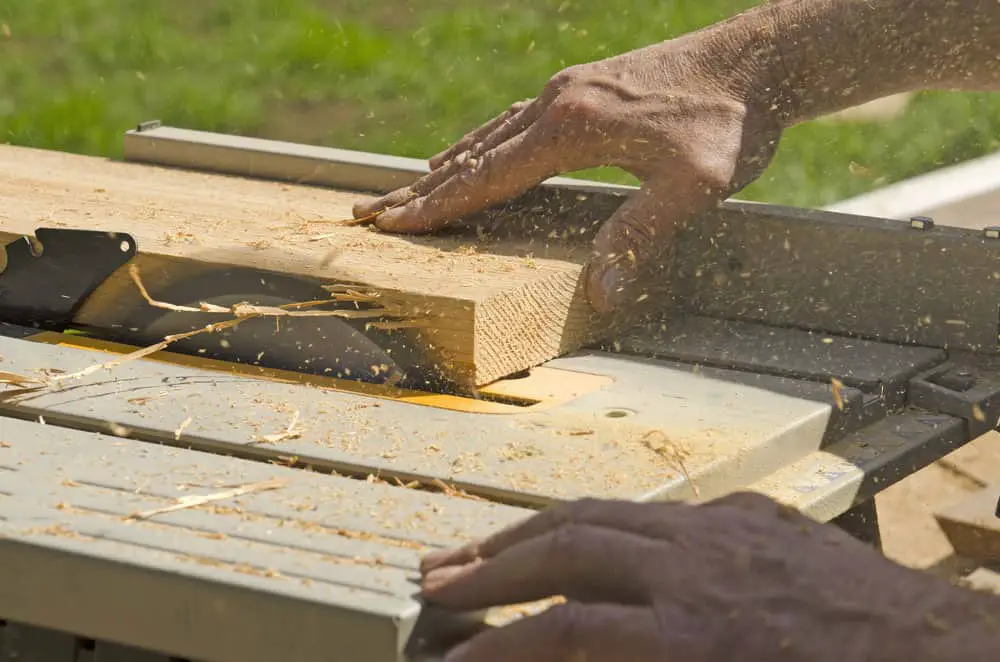 A contractor using a table saw