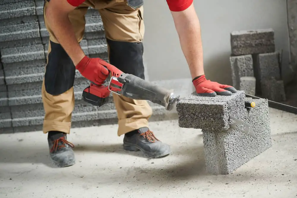 Concrete cutting with a cordless reciprocating saw.