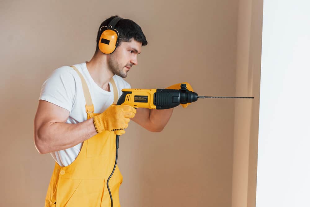 Working indoors with a hammer drill