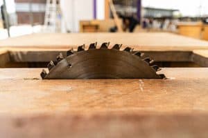 A table saw cutting wood