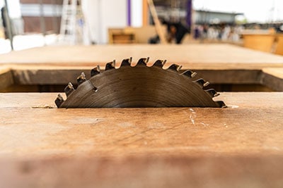 A table saw cutting wood