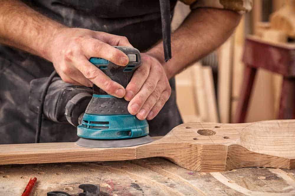 A power hand sander