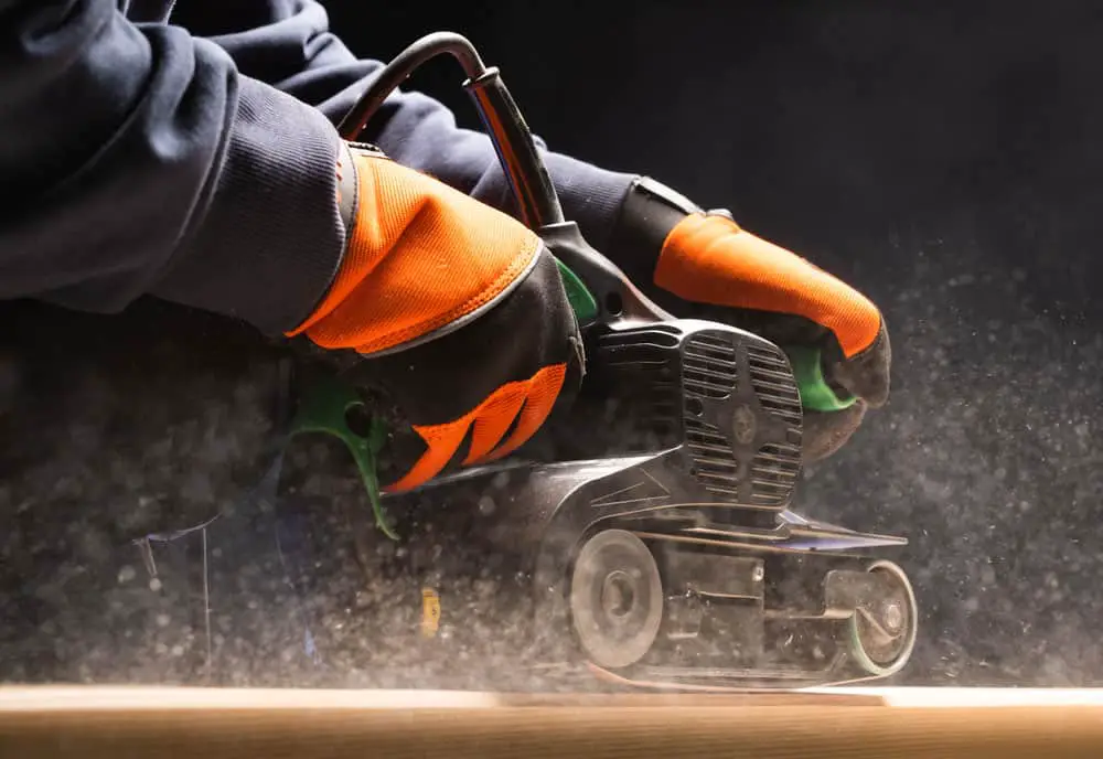 Small hand-held belt sander.