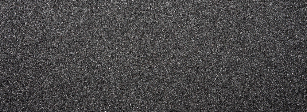 Black sandpaper made of regular carborundum.