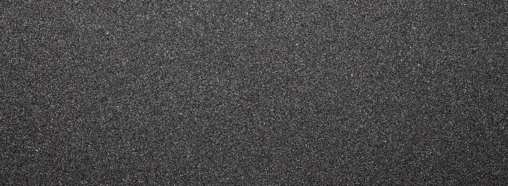 Black sandpaper made of regular carborundum.