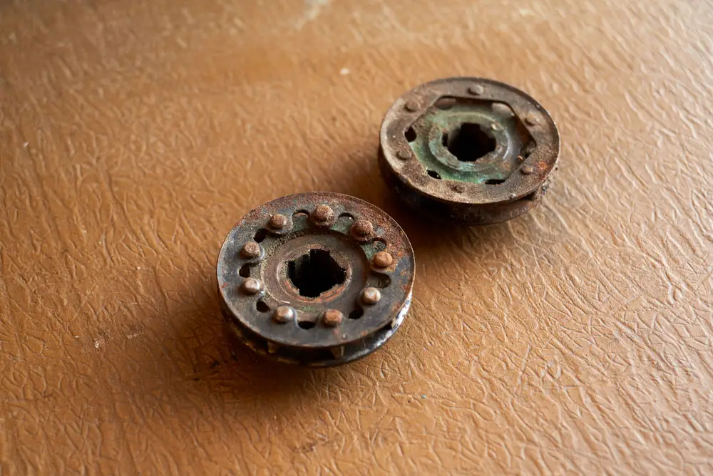 Worn out chainsaw sprockets